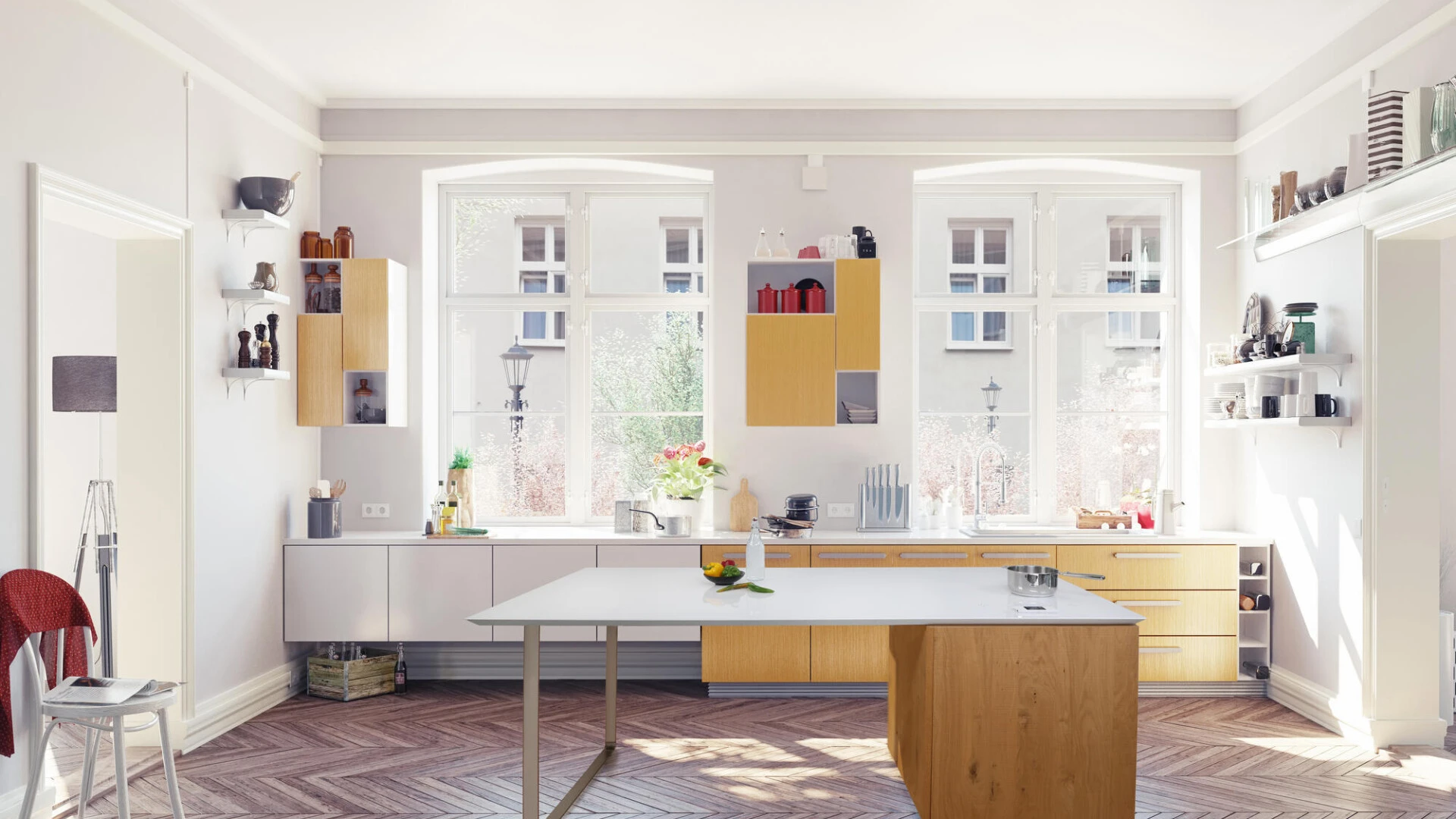 Aufnahme einer hellen, modernen Küche mit großen Fenstern, weißen Wänden und Holzmöbeln. Copyright Saint-Gobain Eurokera